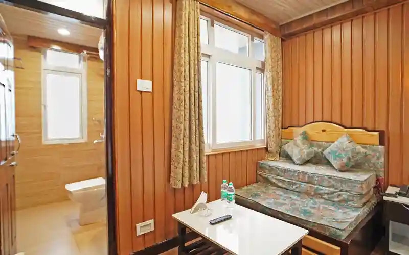 Eco-friendly hotels in Darjeeling offering warm wooden décor and comfortable seating